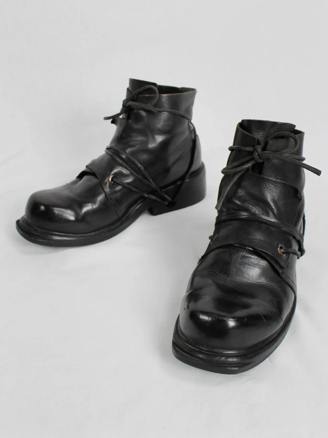 Black mountaineering boots with laces through the soles by Dirk Bikkembergs, size 42, from the late 1990s.