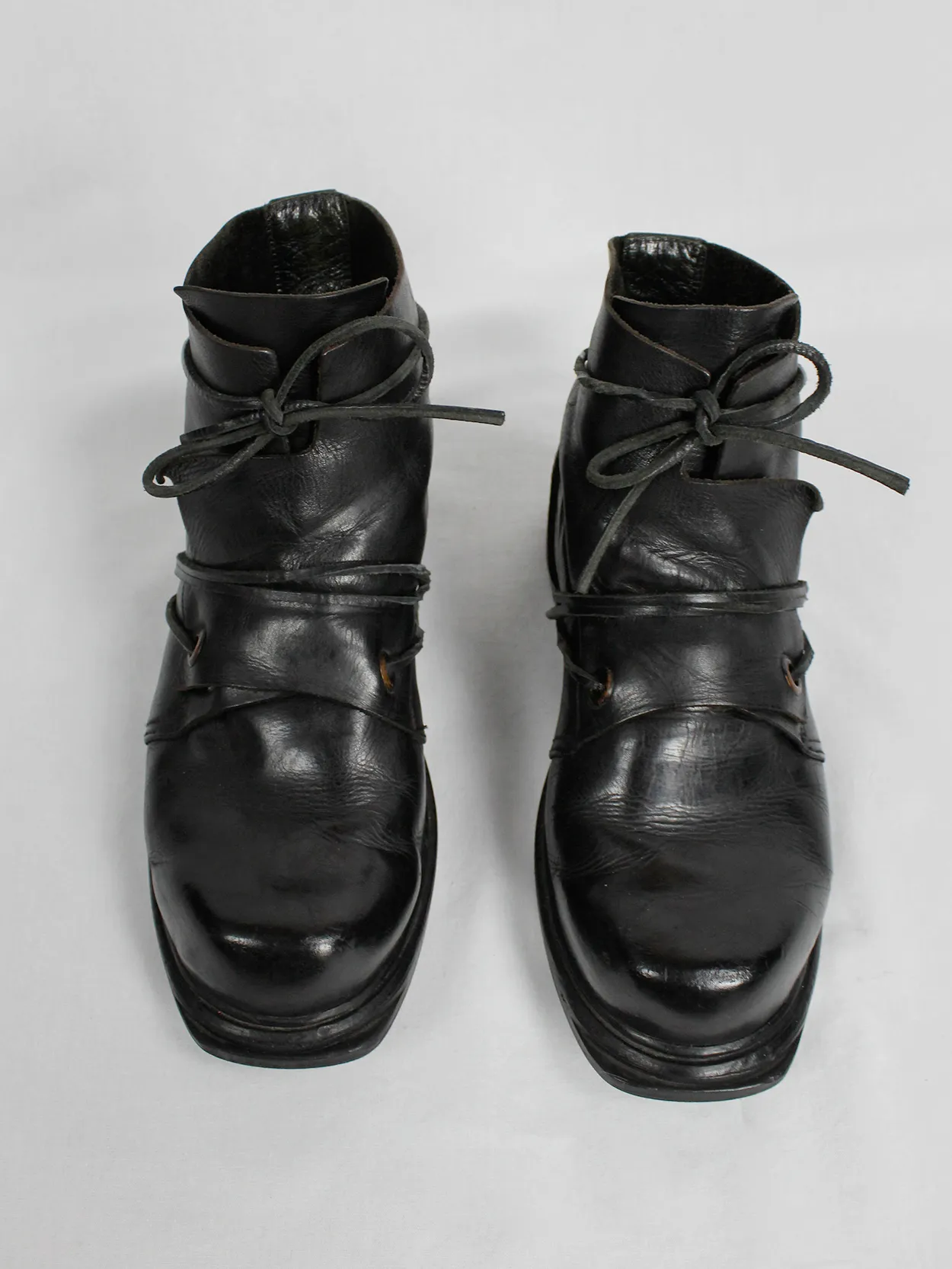 Black mountaineering boots with laces through the soles by Dirk Bikkembergs, size 42, from the late 1990s.