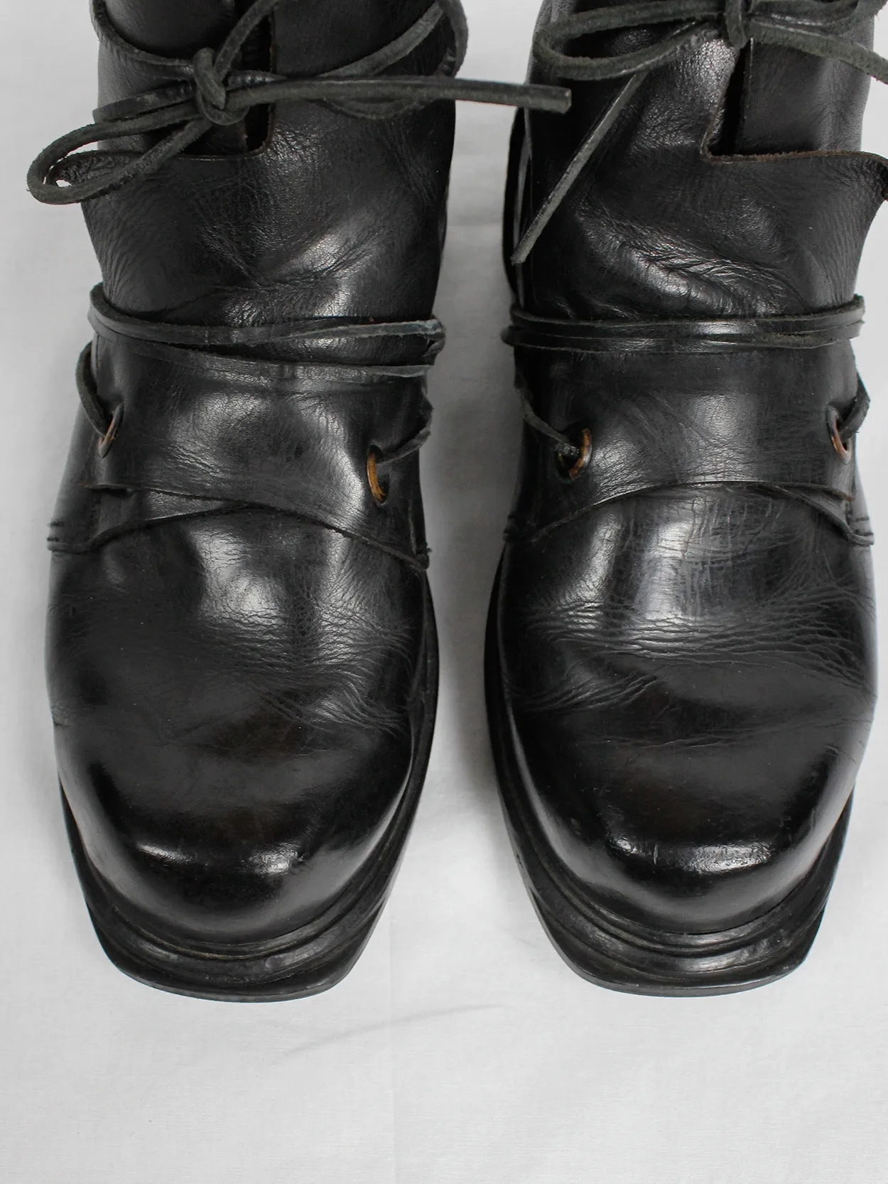 Black mountaineering boots with laces through the soles by Dirk Bikkembergs, size 42, from the late 1990s.