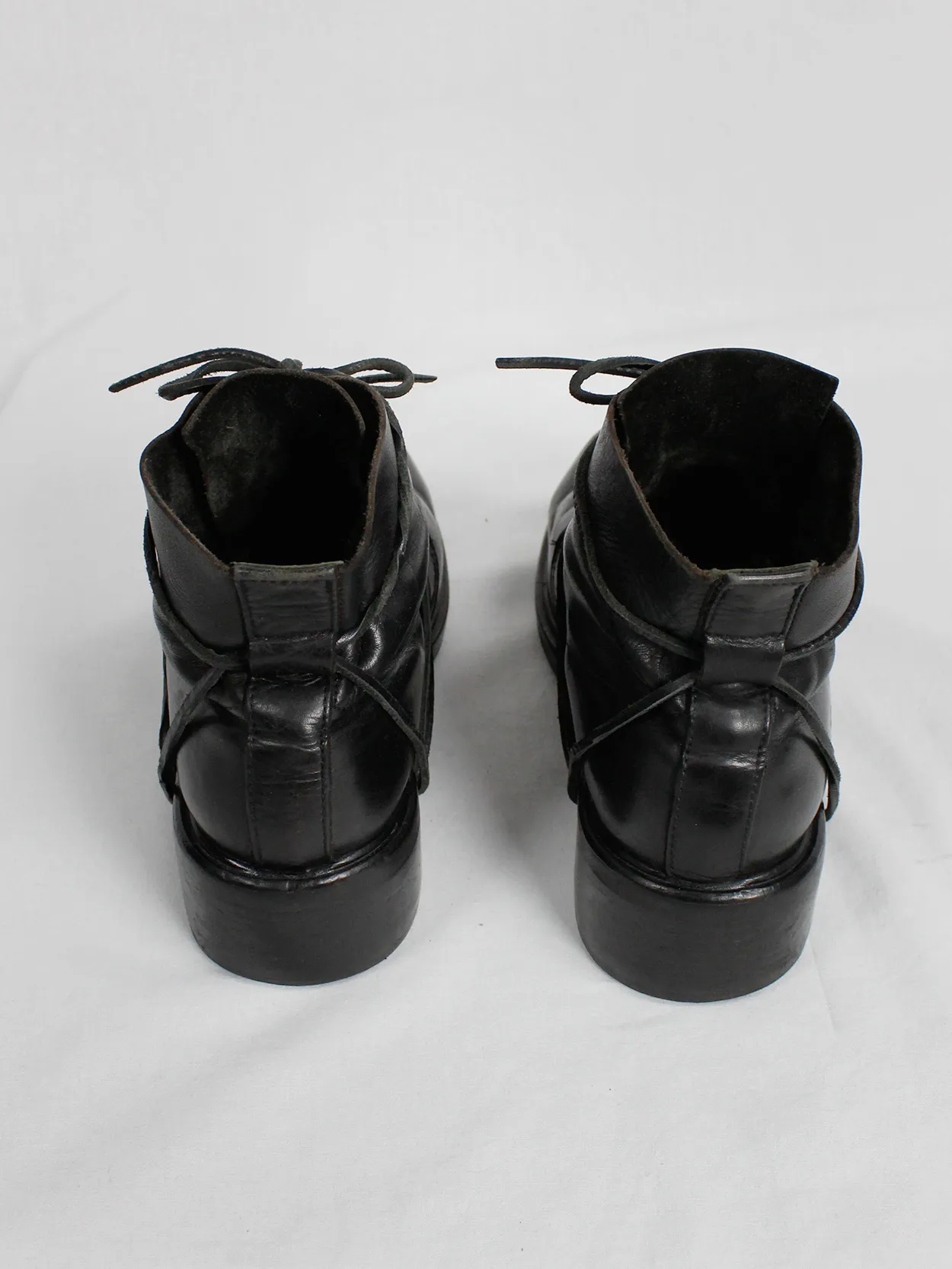 Black mountaineering boots with laces through the soles by Dirk Bikkembergs, size 42, from the late 1990s.