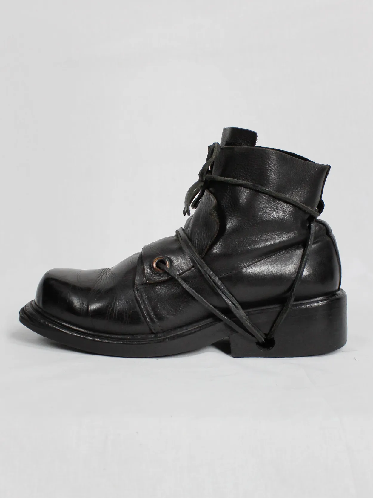 Black mountaineering boots with laces through the soles by Dirk Bikkembergs, size 42, from the late 1990s.