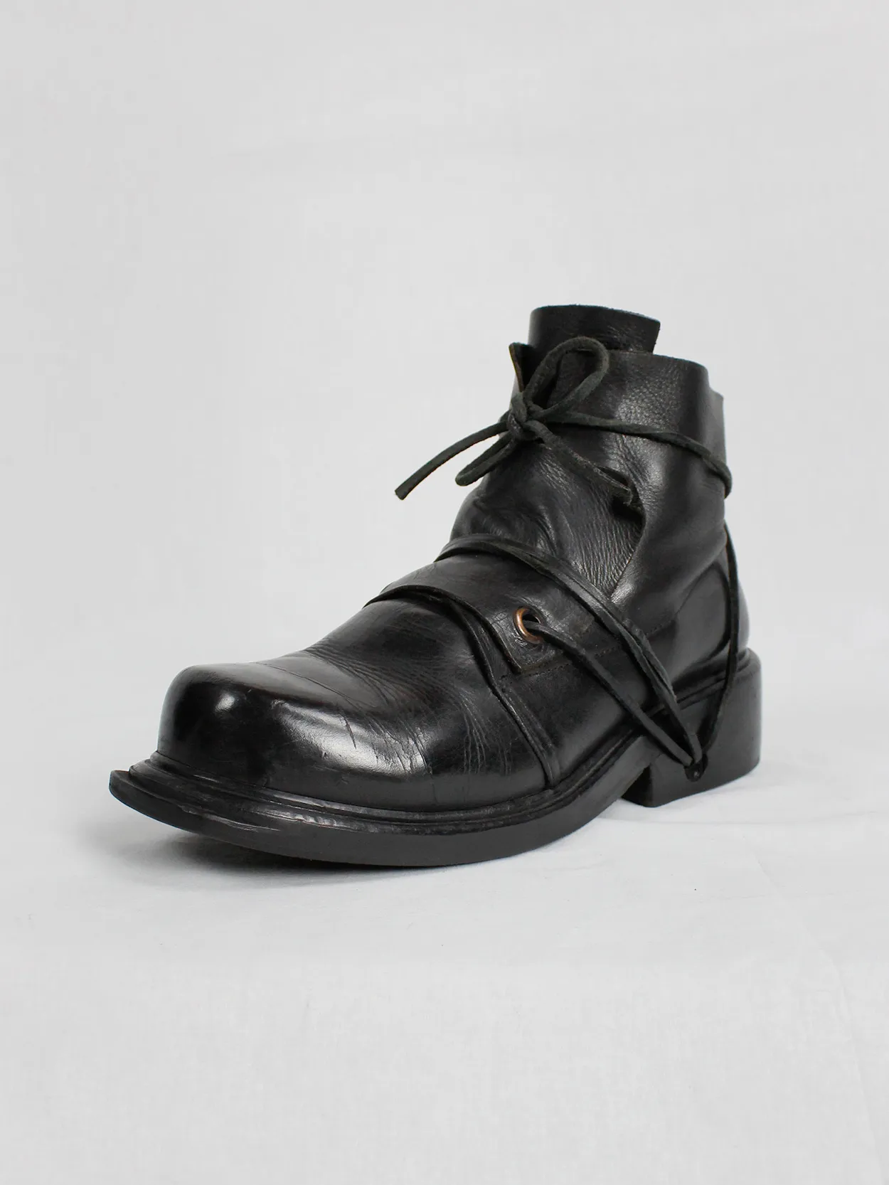 Black mountaineering boots with laces through the soles by Dirk Bikkembergs, size 42, from the late 1990s.