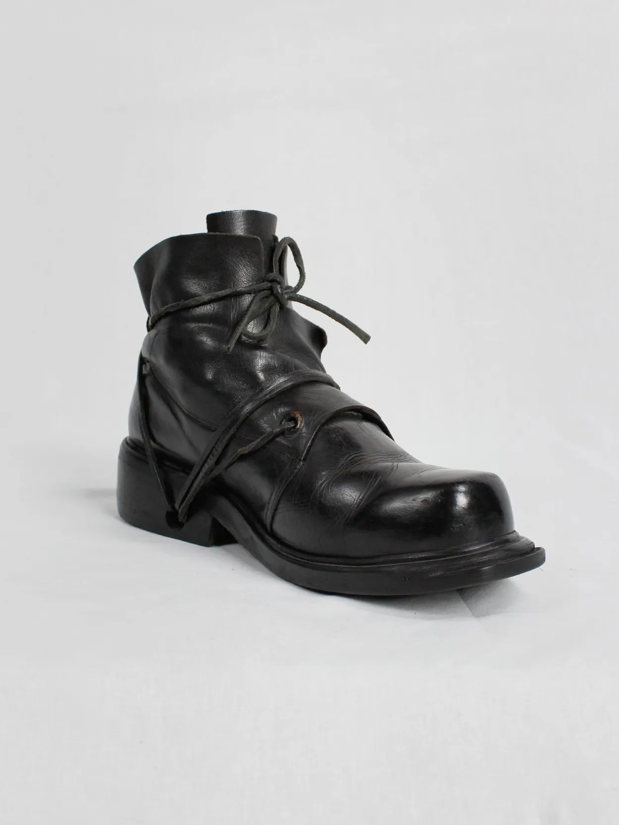 Black mountaineering boots with laces through the soles by Dirk Bikkembergs, size 42, from the late 1990s.