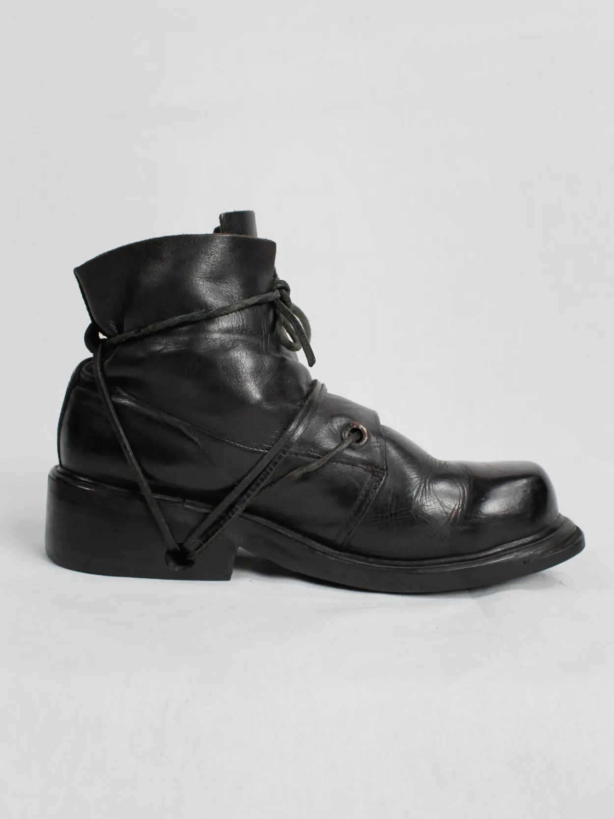 Black mountaineering boots with laces through the soles by Dirk Bikkembergs, size 42, from the late 1990s.