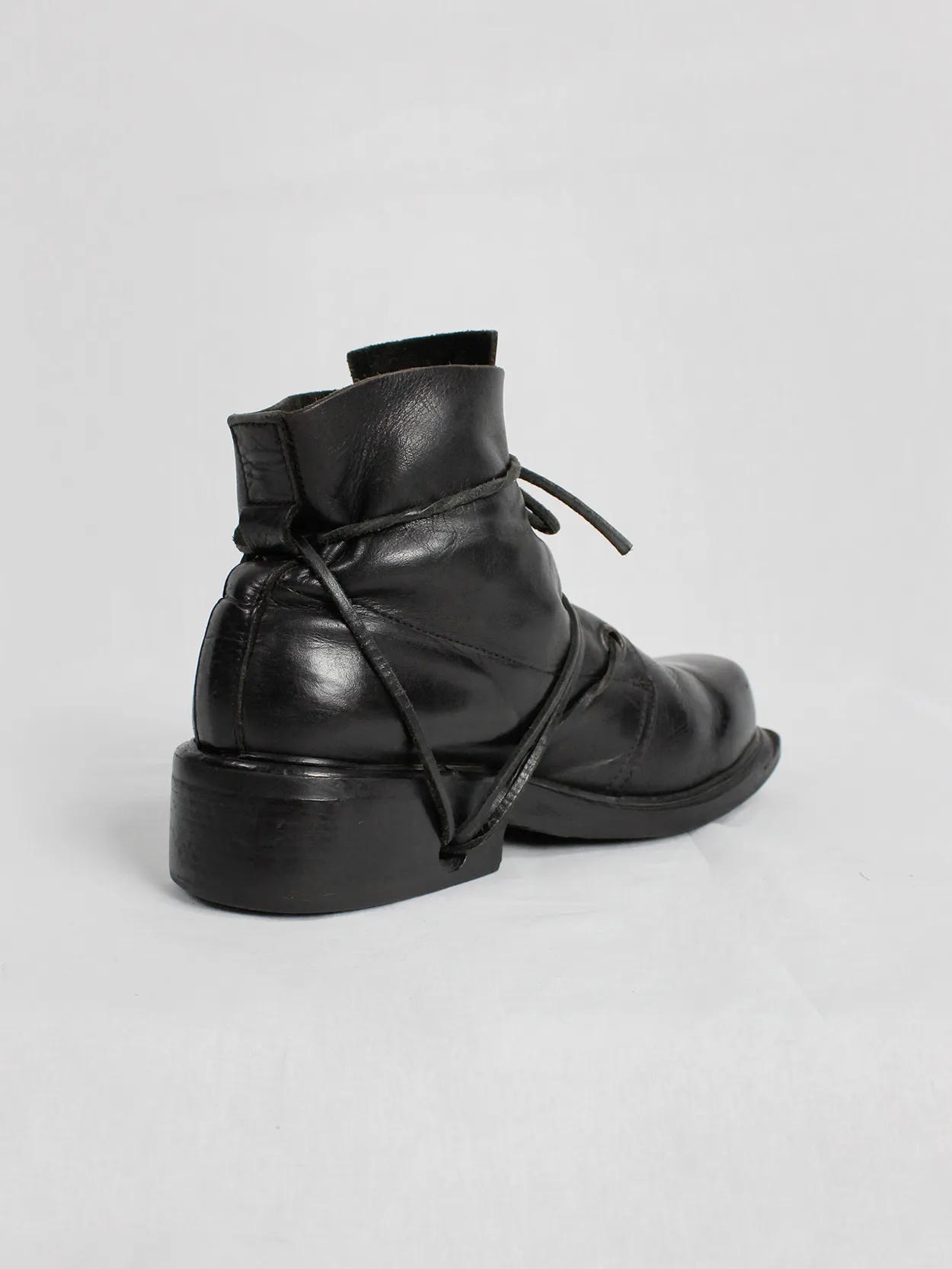 Black mountaineering boots with laces through the soles by Dirk Bikkembergs, size 42, from the late 1990s.