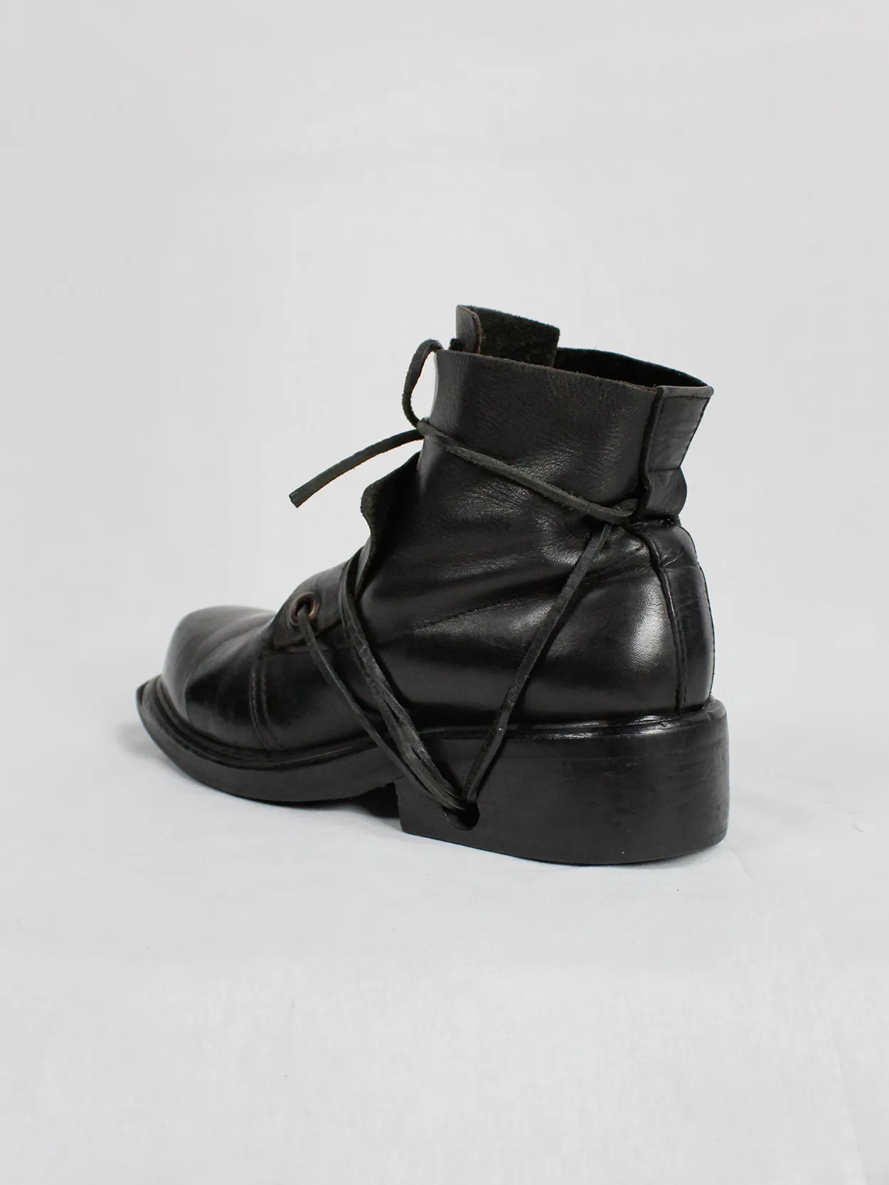 Black mountaineering boots with laces through the soles by Dirk Bikkembergs, size 42, from the late 1990s.