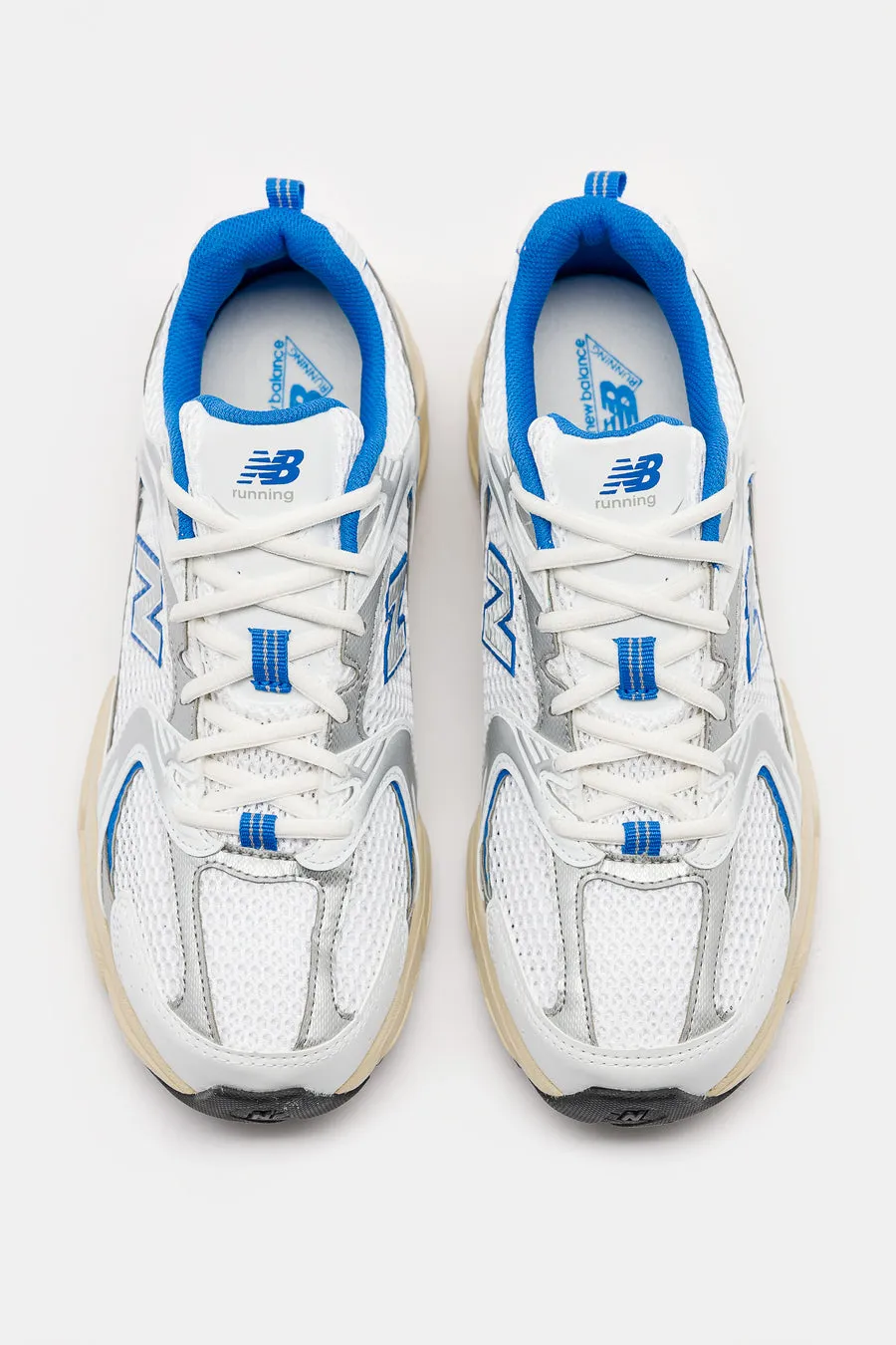 Classic White and Blue Oasis New Balance 530 Sneaker