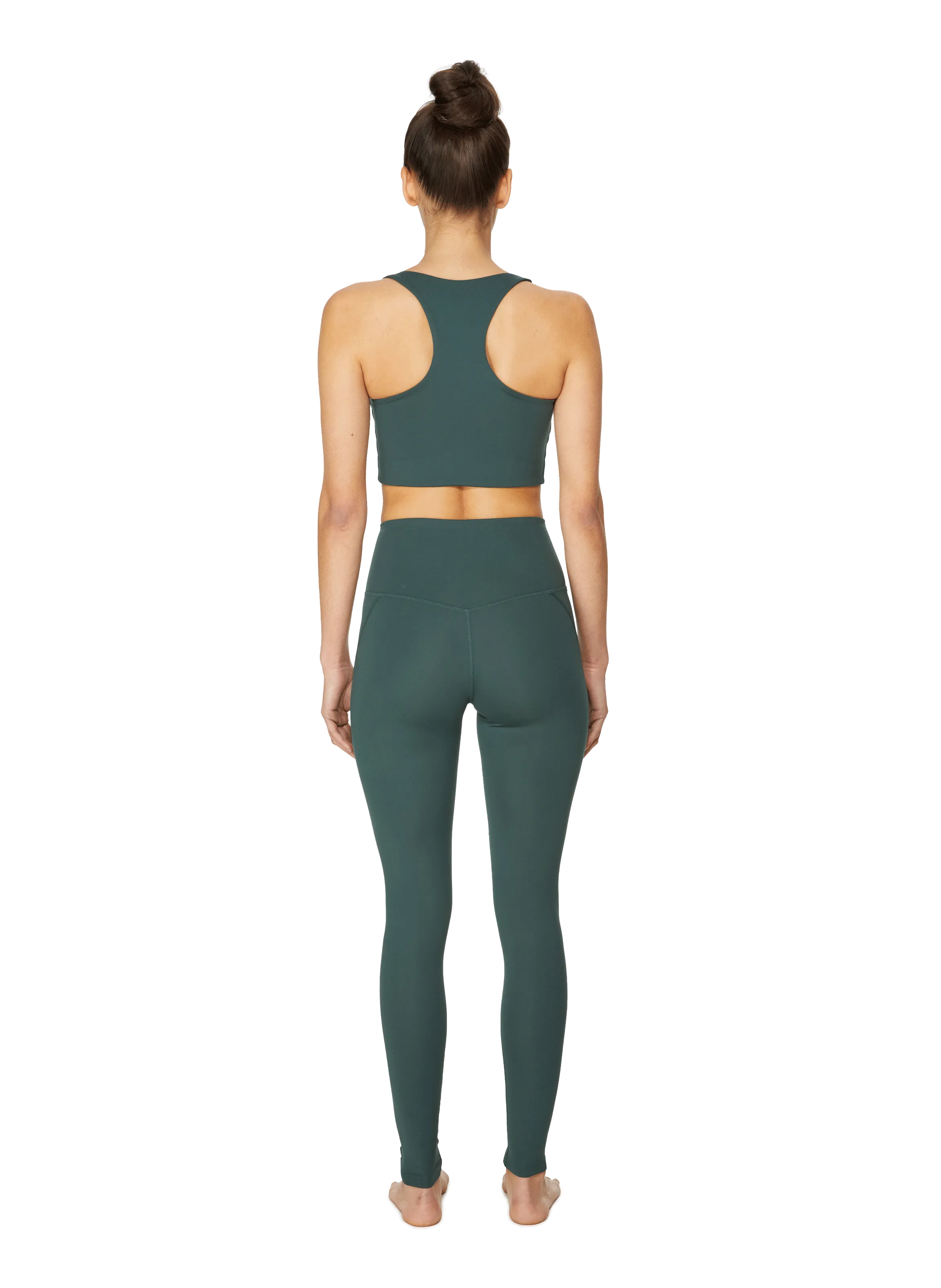 High-waisted green leggings by Girlfriend Collective