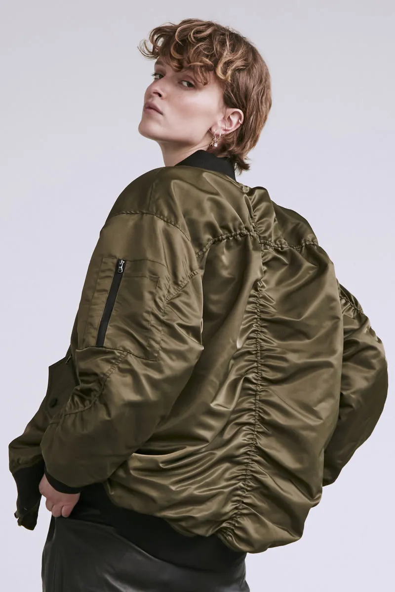 Olive Bomber Jacket from Copenhagen Muse - Shop Now.