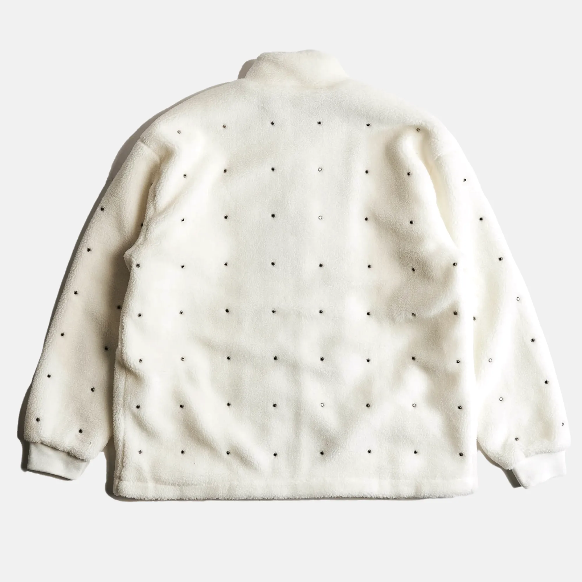 White Leo Zip Sherpa embellished sweater.